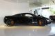 2012 McLaren  Dusseldorf. 12C COUPE Carbon Black Sports Car/Coupe Used vehicle photo 1